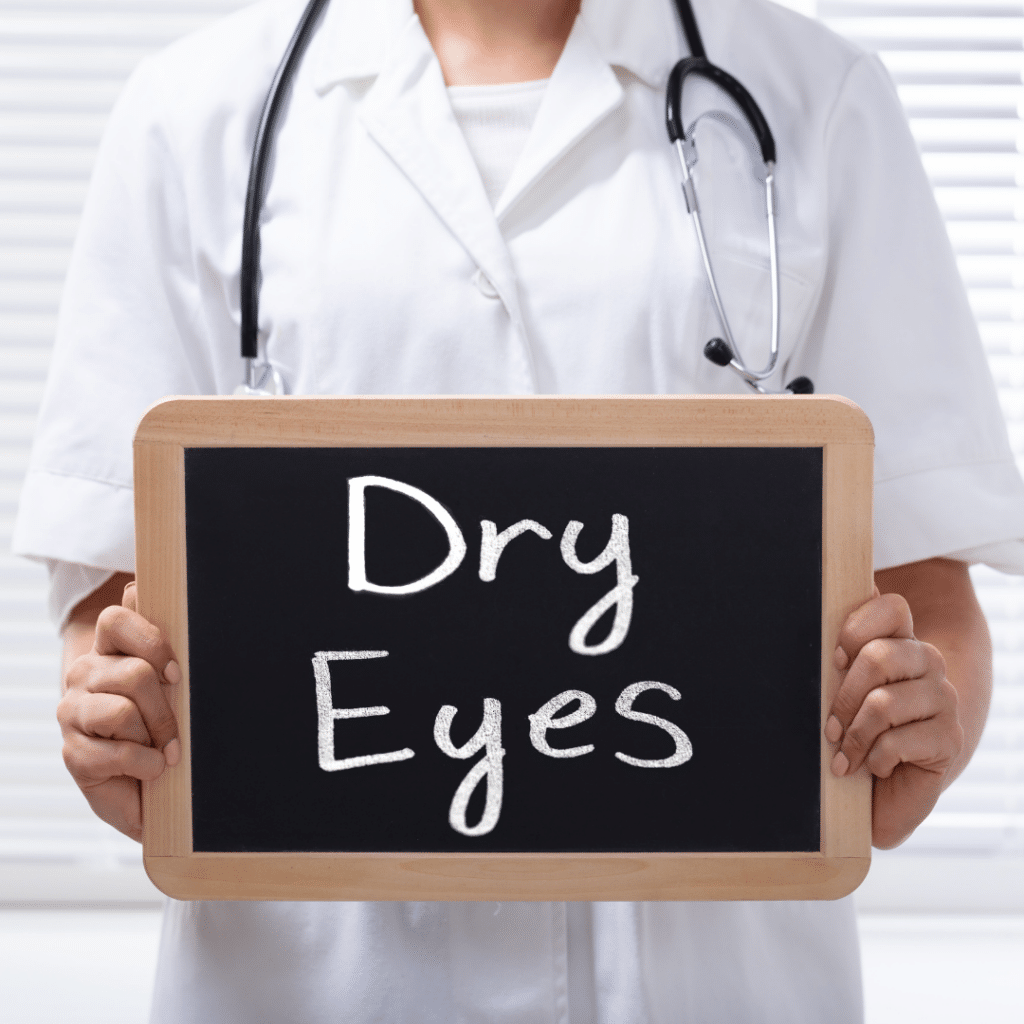 Doctor holding a dry eyes sign